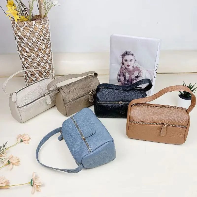 Dompet wanita tempat kosmetik jingjing bahan kulit sapi papirut