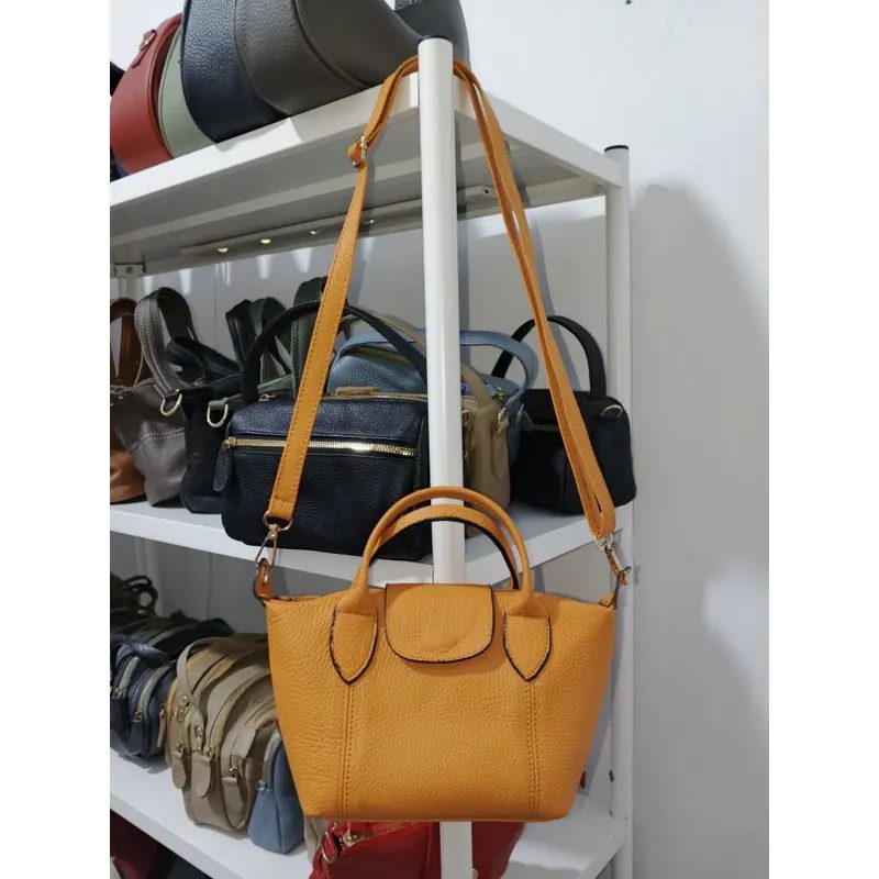Tas selempang wanita LC ukuran kecil bahan papirut kulit asli
